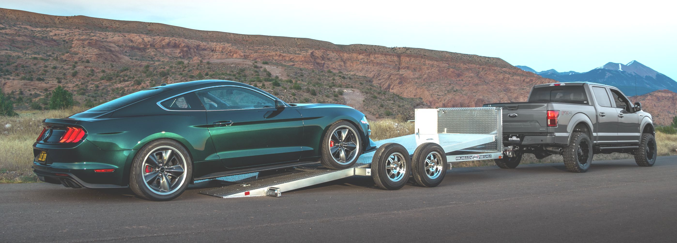 Steeda Mustang Bullitt loading onto JIMGLO open car trailer